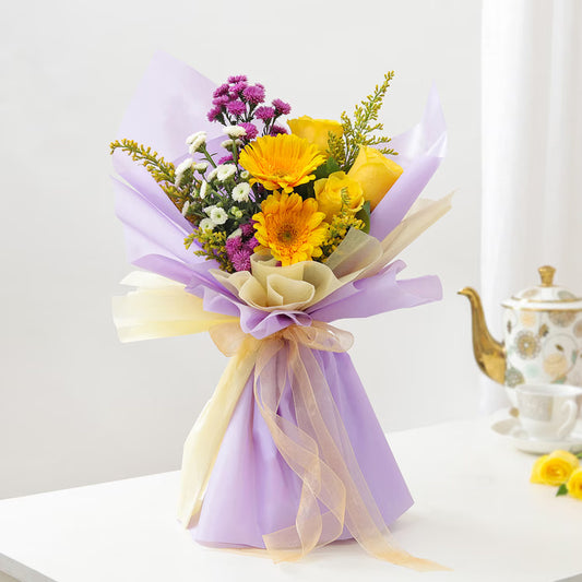 Premium mixed flower bouquet with roses, gerberas, carnations and lavender wrapping