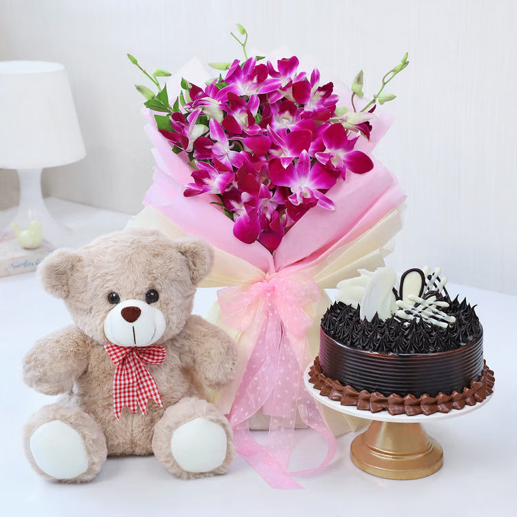 Purple orchid bouquet with chocolate cake and teddy bear for gift