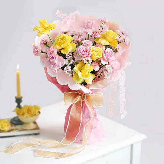 Pink and yellow roses bouquet in premium pink wrapping for birthday anniversary and congratulations gift