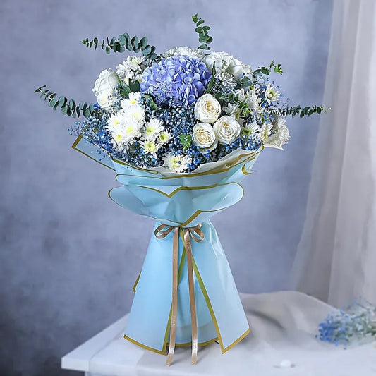 Blue hydrangea and white roses bouquet in premium sky blue wrapping for birthday and congratulations gift